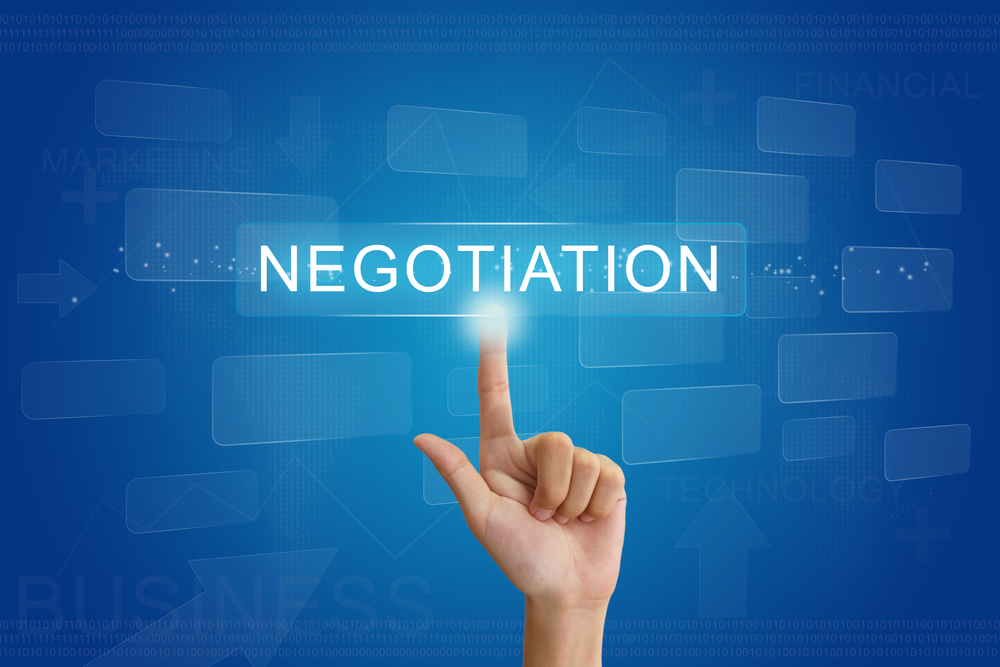 hand press on business negotiation button on touch screen